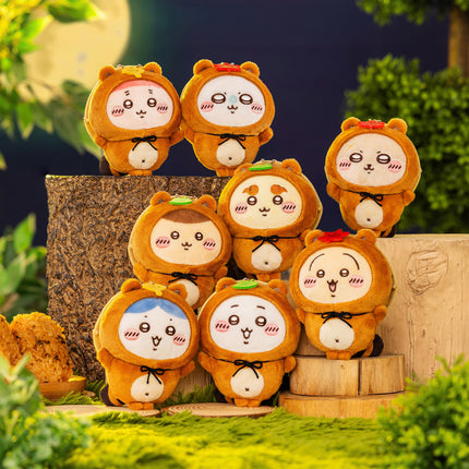 Tanuki series plush set on wooden blocks, several brown mascots with white faces and leaf accents