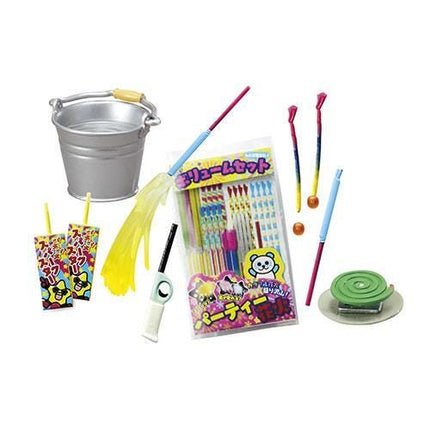 various colorful and playful items, including a bucket, a toy broom, a toy mop, a toy cup, a toy pen, a toy toothbrush, a toy sponge, and a toy plate.