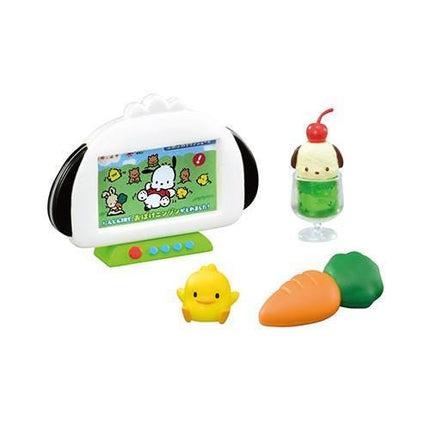 a toy set with a television screen, a dog figurine, a carrot, and a yellow bird figurine.