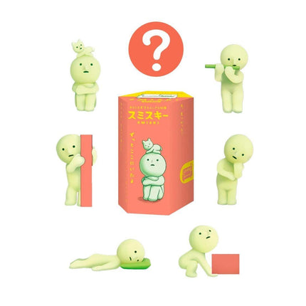 a collection of seven small, green figurines arranged in a circular pattern, with a large pink box in the center. Above the box, there is a question mark symbol.