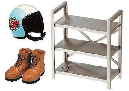 a helmet, a pair of boots, and a three-tiered metal shelf.