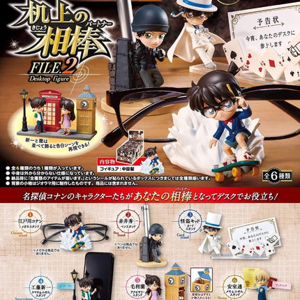 The image is an advertisement for a collection of desktop figurines, featuring various characters from the "Detective Conan" series. The figurines are displayed in different poses and settings, such as a person holding a phone, a person riding a skateboard, and a person holding a book. The advertisement includes text in Japanese, which is not transcribed here, and there are additional details about the figurines and their features, such as the price of $6.00.