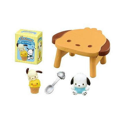 a variety of cute and colorful toys, including a small dog figurine, a toy ice cream cone, a toy spoon, and a toy chair.