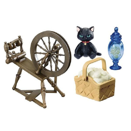 a wooden spinning wheel, a black cat figurine, a basket, and a blue vase.