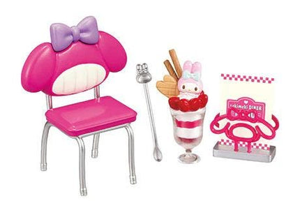 a pink chair with a purple bow, a spoon, a glass filled with ice cream and a cherry, and a sign for a diner.