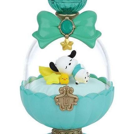 A decorative perfume bottle with a green lid and a bow, featuring a small figurine of a dog and a bird inside.