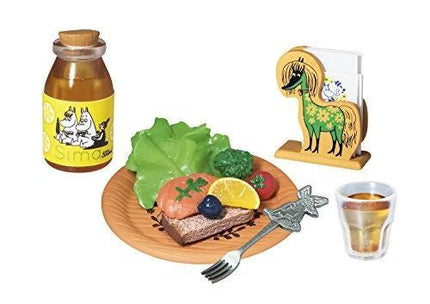 a variety of food items and a drink, including a bottle of honey, a plate with a sandwich, a cup, a fork, and a small toy horse.