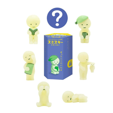 a collection of seven small, glowing figurines in various poses, with a blue box featuring Japanese text and a question mark above them.