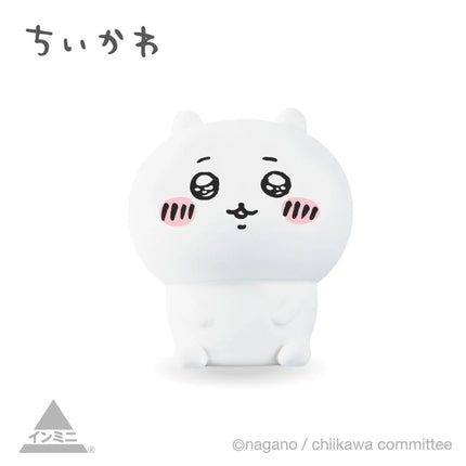 Interior mini figure, light blue bear-like character with closed eyes, standing