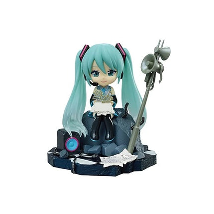 Teal-haired anime figurine sitting on dark base holding a microphone-like stand