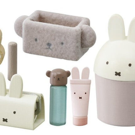 Dollhouse storage and figures set with teacup bed, candle holder, tubes, and rabbit