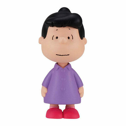 PEANUTS capsule toy figure of a boy in a purple shirt and red shoes