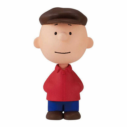 PEANUTS capsule toy figure of a boy in a red jacket and blue pants