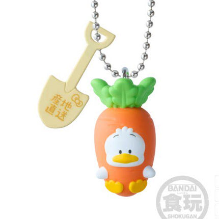 Vegetable charm keychain with orange duck-face figure, green leaf top, silver chain
