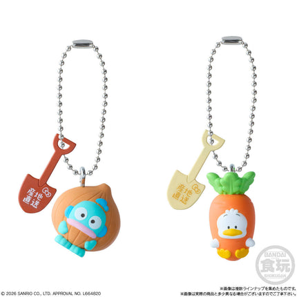 Two character charm keychains: blue face charm and orange duck face charm with silver chains