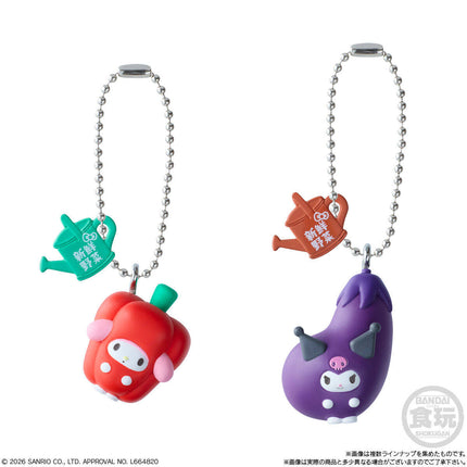 Two character charm keychains: red mushroom face charm and purple eggplant charm with silver chain