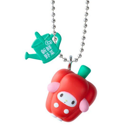 Red fruit character charm keychain with green carrot tag and silver ball chain