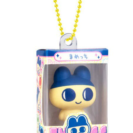 Blue character gumiture charm in box with yellow beaded keychain