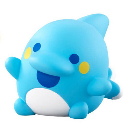 Blue soft vinyl figure with smiling face, white belly, and short rounded tail