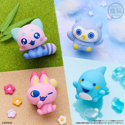Soft vinyl character figures posed on grass and a light ground surface