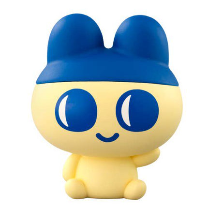Close-up soft vinyl bunny-like figure with blue ears and yellow body