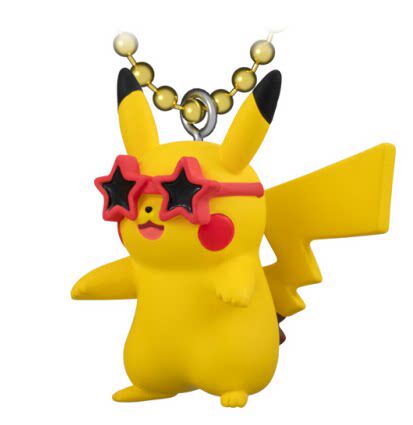Yellow Pikachu mascot keychain with ball chain and star-shaped holiday accessory