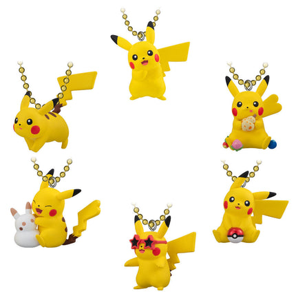 Multiple Pikachu mascot keychains shown together, each with gold ball chain and charms