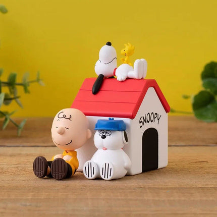 Snoopy house vignette with Charlie Brown, Snoopy, and yellow bird figurines