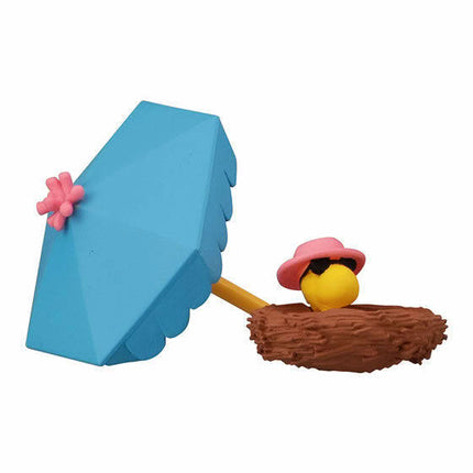 Peanuts-style toy accessory: blue umbrella with pink flower and small bird on nest