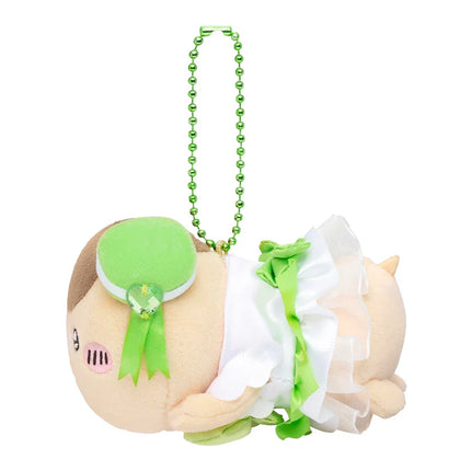 Plush mascot keychain with tan face, green ribbon and white ruffle, green bead strap