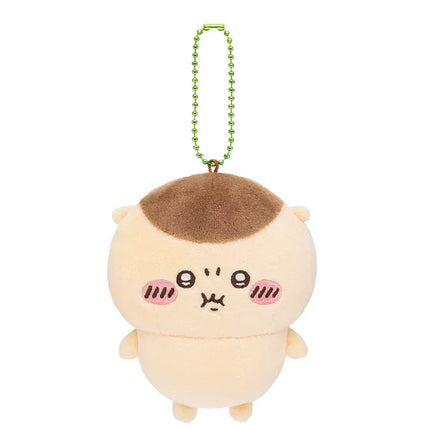 Cream plush mascot holder with brown face and rosy cheeks, green bead chain