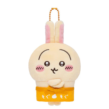 Plush mascot holder with gold beaded chain, beige bunny face with pink ears and yellow outfit