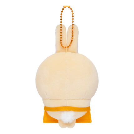 Back view plush mascot holder with gold beaded chain, beige body with yellow outfit hem