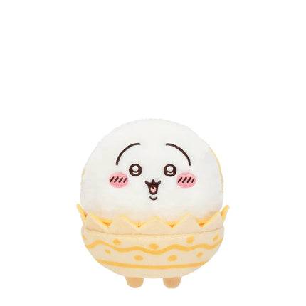 White plush Easter mascot keychain with closed-eye face in a yellow egg shell