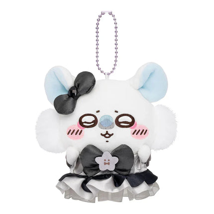White plush mascot keychain with long chain, black bow, and blue ear accents
