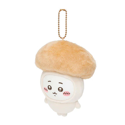 Plush mascot keychain: white character with tan beret cap, gold chain, side-looking face