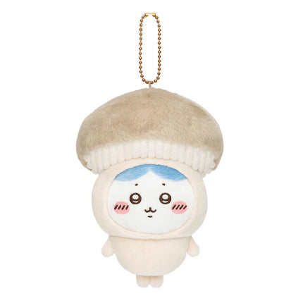 Single seasonal plush keychain with tan knit beret and light blue top, on gold chain
