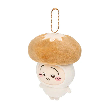 Plush mascot keychain: white character with tan star-topped beret cap, gold chain, wink face