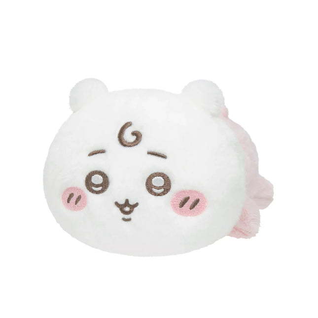 White crawling plush toy with closed-eye smile and embroidered round face, small paws