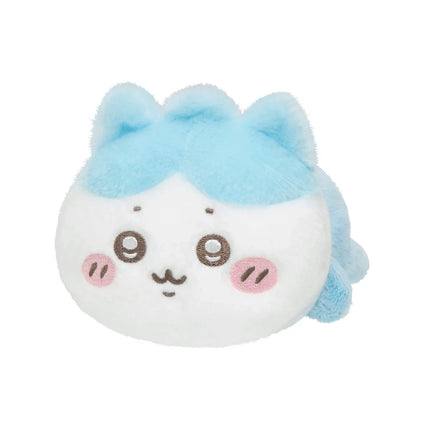 White-and-blue crawling plush toy with embroidered face, blue bow-like ears, and paws
