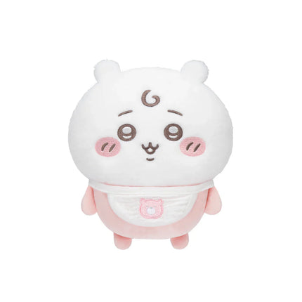 White plush baby swaddle with smiling face, blush cheeks, and pink hand covers