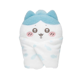 White and blue baby swaddle plush with bunny-like character face and blue ears