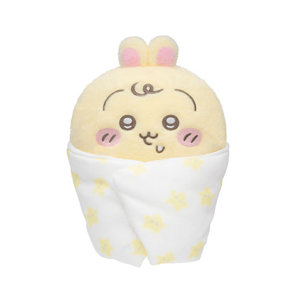 White baby swaddle plush with yellow bear ears and star pattern