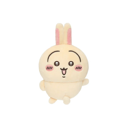 Cream rabbit plush with pink inner ears, round eyes, and small smiling mouth