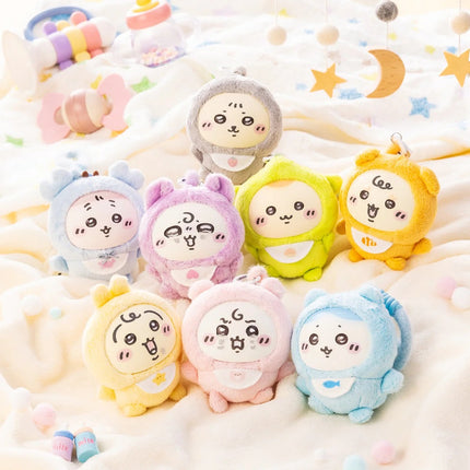 Set of small character plushies in pastel colors, each with a printed face