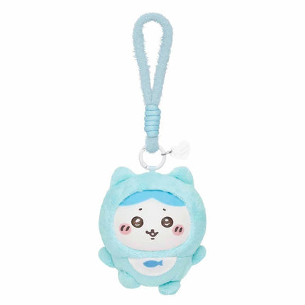 Light blue plush keychain charm with cartoon face and hanging loop