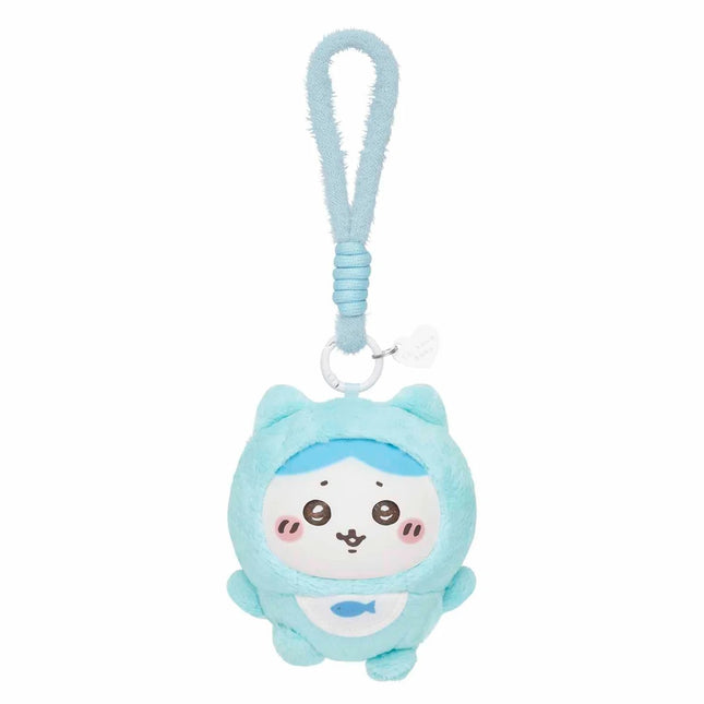 Light blue plush keychain charm with cartoon face and hanging loop