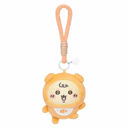Orange shisa-style plush keychain with hanging loop and smiling face