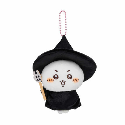 Plush mascot keychain with black witch hat and robe, holding a small wooden wand