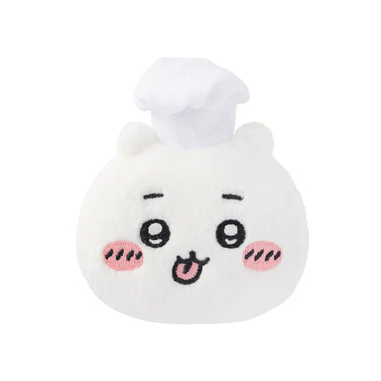 White plush chef face badge with chef hat and smiling embroidered eyes